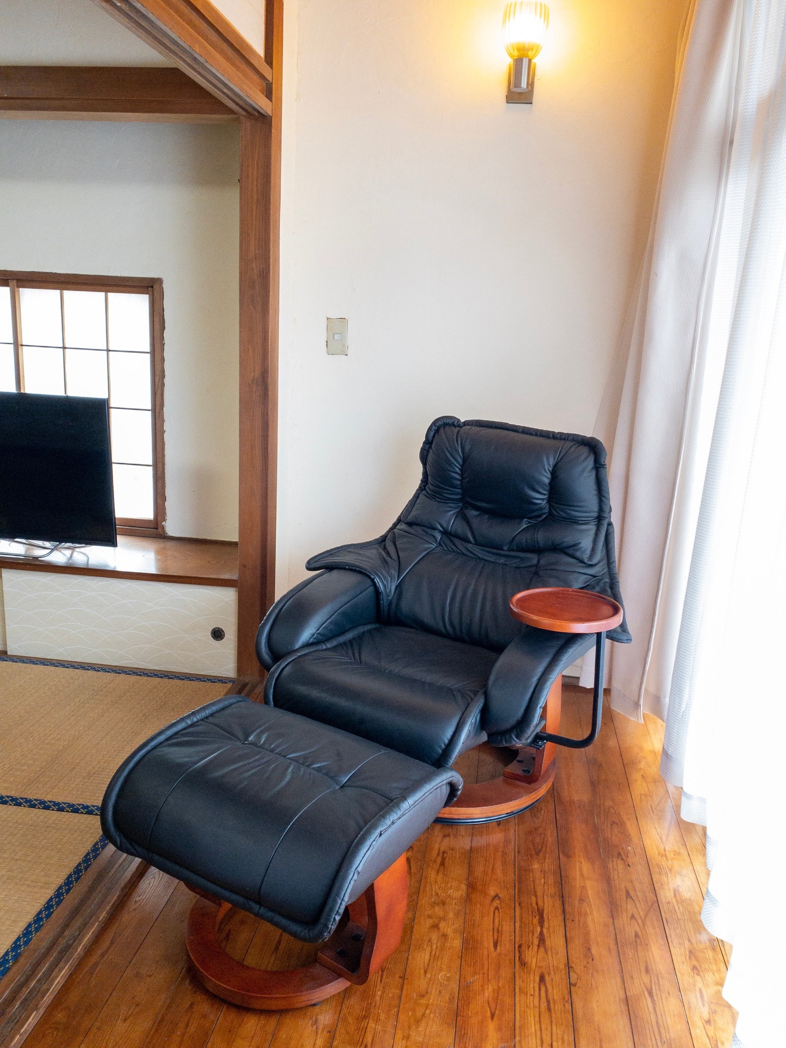 ”Engawa” with two reclining chairs facing the balcony.
