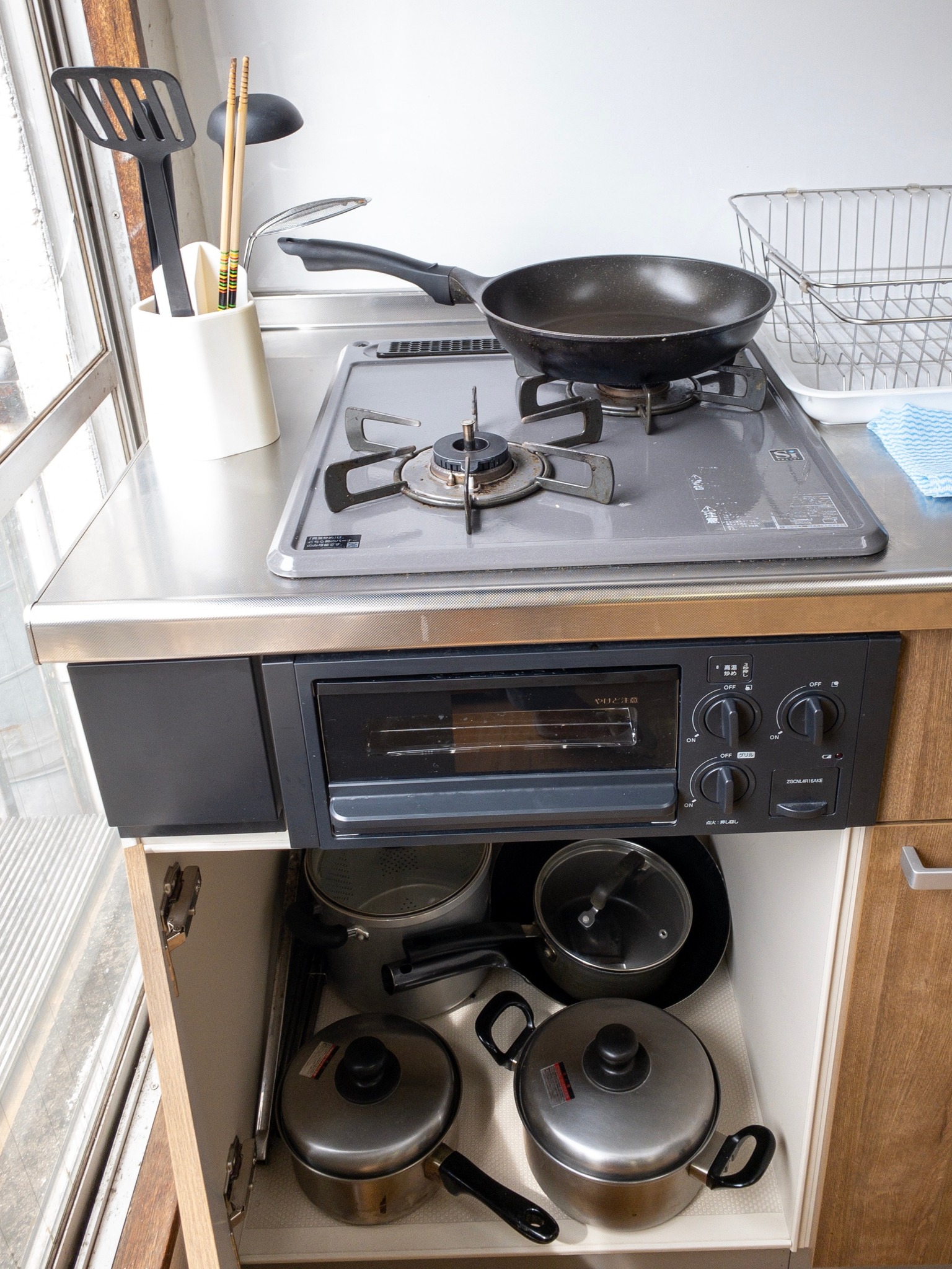Spacious kitchen with kitchen appliances.