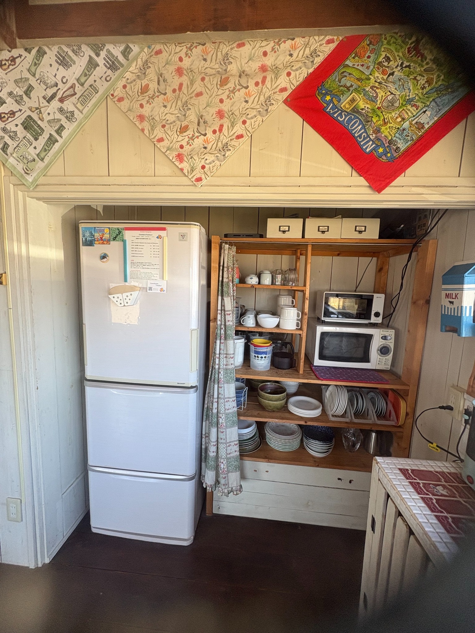 Microwave oven, dishes, and refrigerator are available.