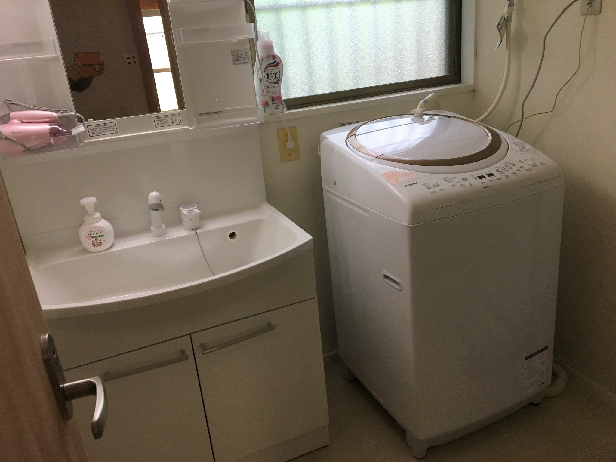 Dressing room . Washing machine with dry function.  Sharing with another guest.